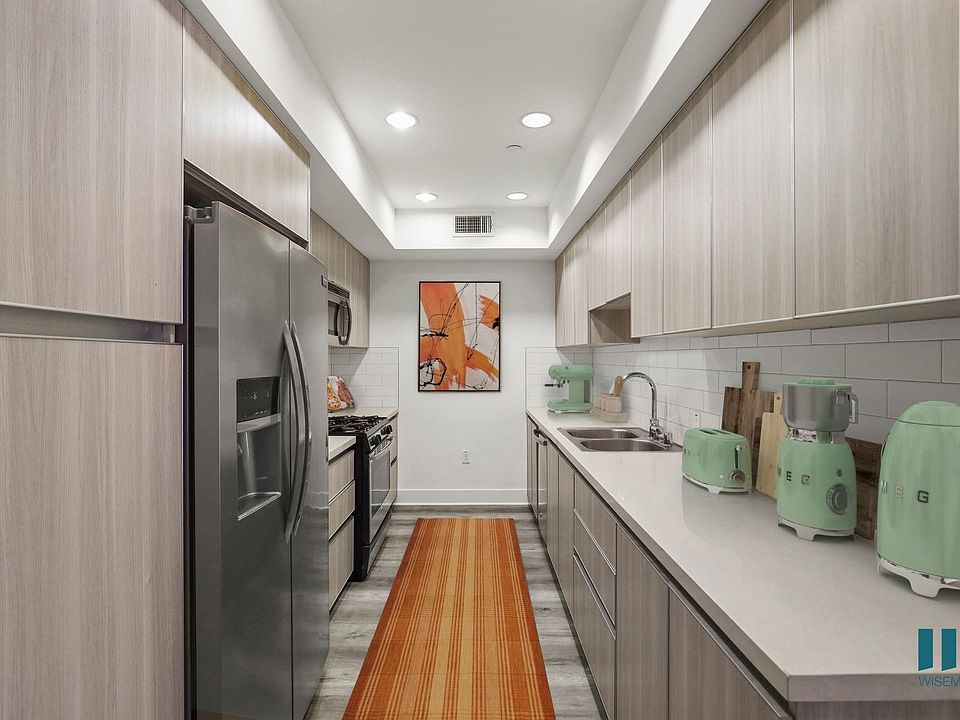 Kitchen with Energy-Efficient Appliances and Ample Cabinet Storage