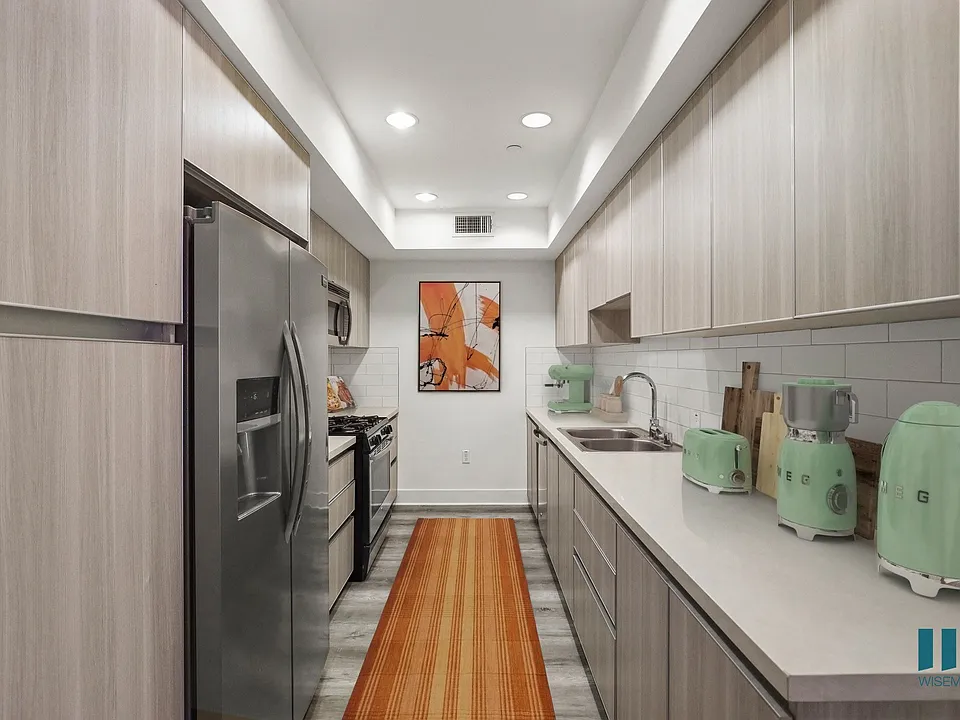 Kitchen with Energy-Efficient Appliances and Ample Cabinet Storage