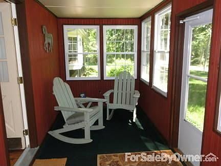 Closed-In Porch
						:
						New Anderson windows. Great reading and relaxing area.