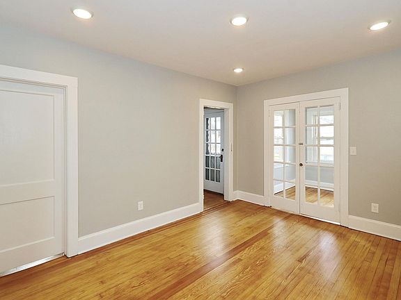 Living Room looking into office/den with french doors
