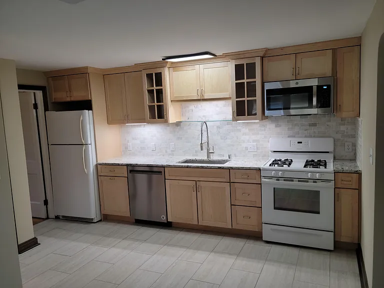 kitchen, granite counter tops, tiles back splash, gas stove, disposal and dishwasher