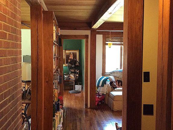 hallway to playroom and stud