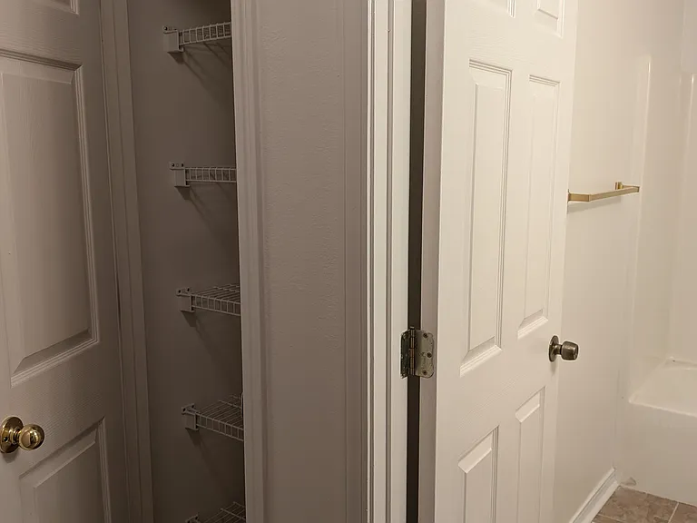 Linen closet and bathroom #2.