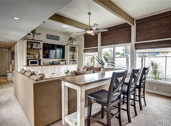 Mid-century modern high beamed ceilings with enclosed atrium.