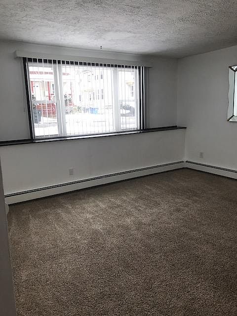 Living room with view of street.