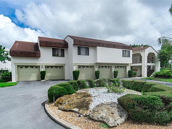 Front view with garage #104 is 2nd from left