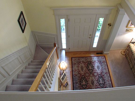 Two-story foyer; faces East 