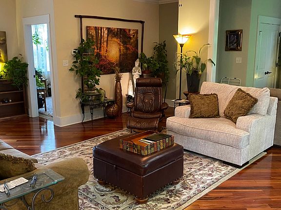 Living room with hardwood floors (Brazilian Tigerwood)