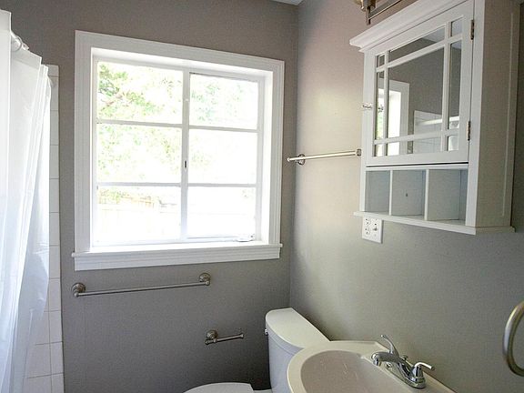 New fixtures, refinished bathtub, tiled bath