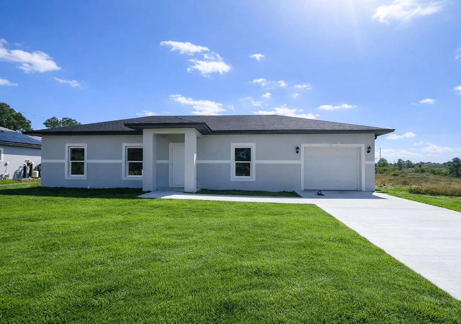 New Construction- Modern 3 Bed / 2 Bath Home In Lehigh Acres — Photo 1
