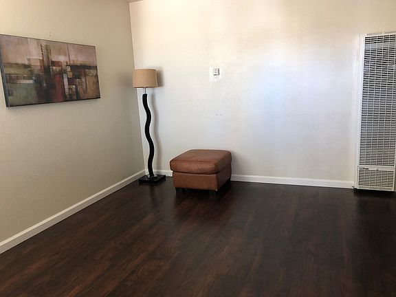 Large family room with new hardwood floors.