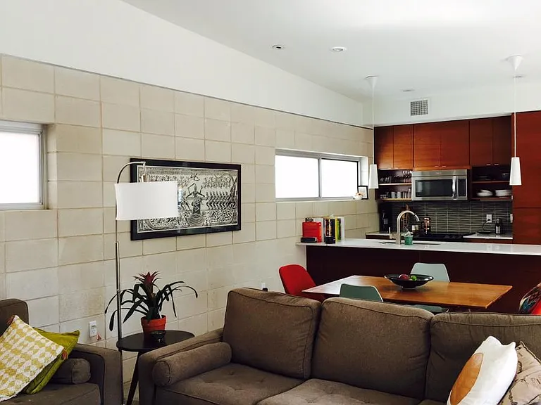 open living area with kitchen view