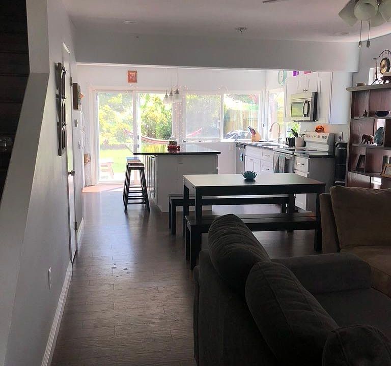 First floor open living plan view from couch area