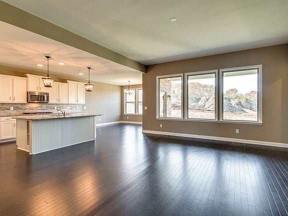The Woodbury Family Room with hardwood floors