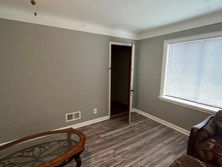 living room with optional attic access for storage