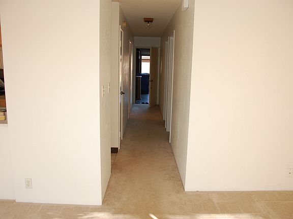 Hall to bedrooms & garage