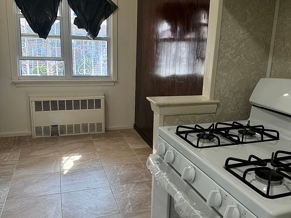 3rd image of 933 E 101st St Floor 2