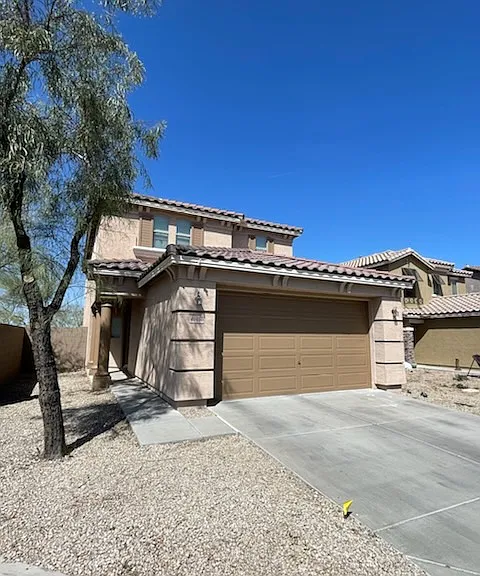 Exterior corner lot. Two car parking space in driveway.