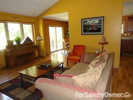 Dining Room/Covered Porch
						:
						two sliding glass doors in dining area (one to porch; other to back yard).