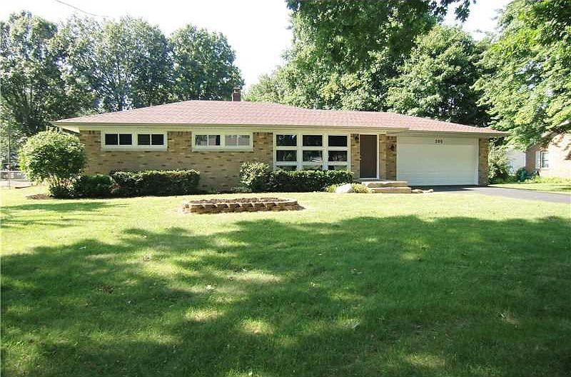 Exterior Front. Full brick ranch on half acre plus lot.