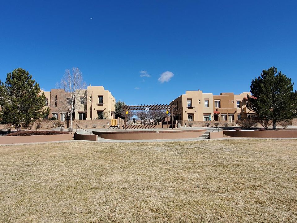 Townhouse (center left) faces a beautiful, community park.