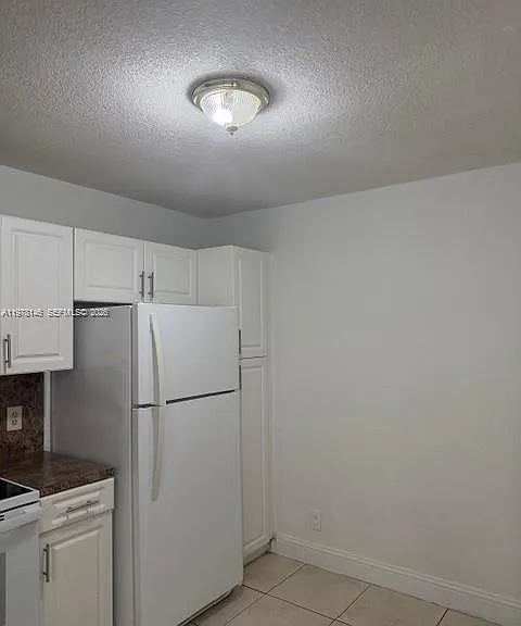 8781 Wiles Rd #103 — Photo 11