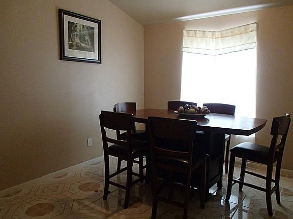 Dining area. You can make it your formal living if preferred.