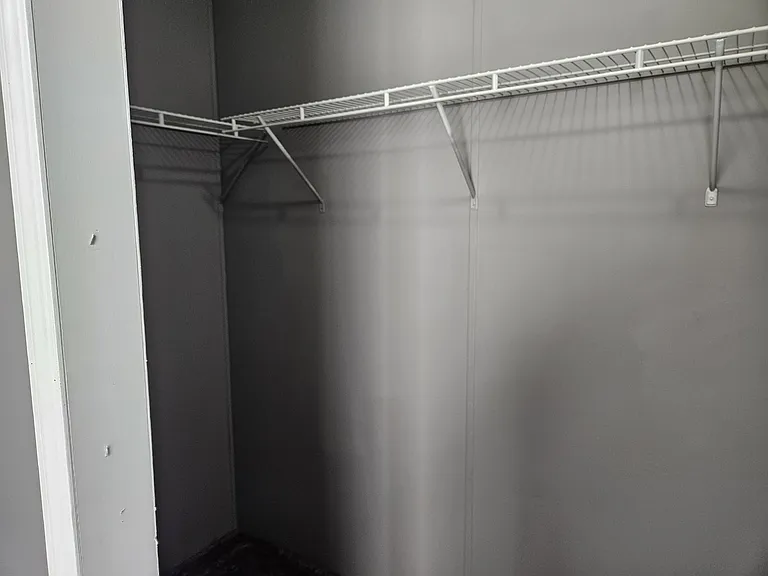 Primary room walk in closet