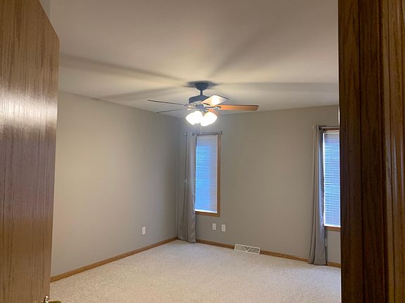 First floor master suite features large bathroom with double sinks, and large walk-in closet.