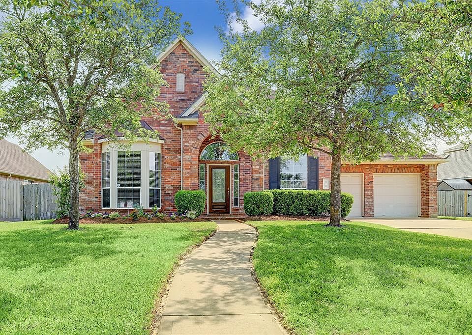 Beautiful one story brick home located on quiet street in desirable Village Creek.