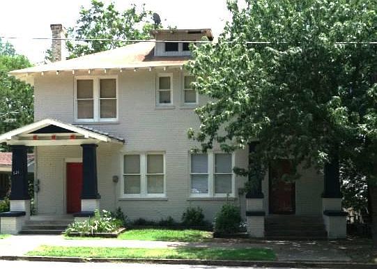 Street view of building. 521 B is accessed from driveway on Hawthorne. The unit is tucked in downstairs at the rear of the building.