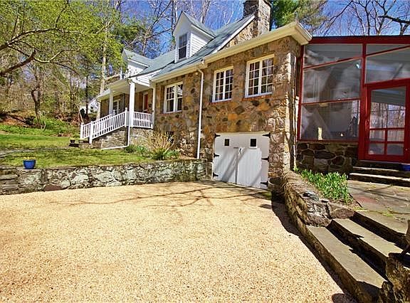 In addition to the one car garage, there is plenty of parking on the new gravel driveway