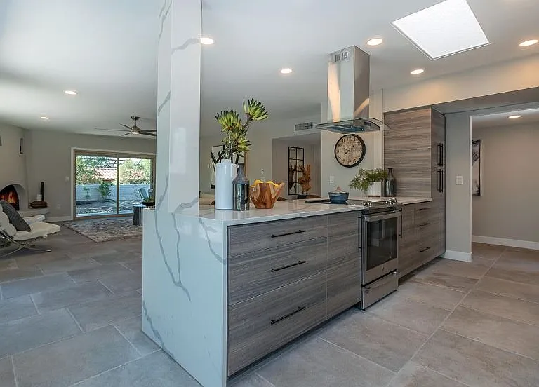 remodeled kitchen with concrete tile floors