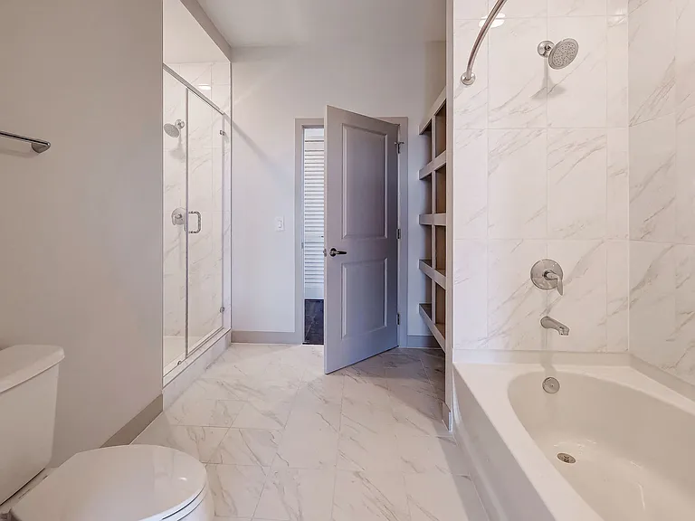 Gorgeous bathroom with dual vanity counter top and soaking tub