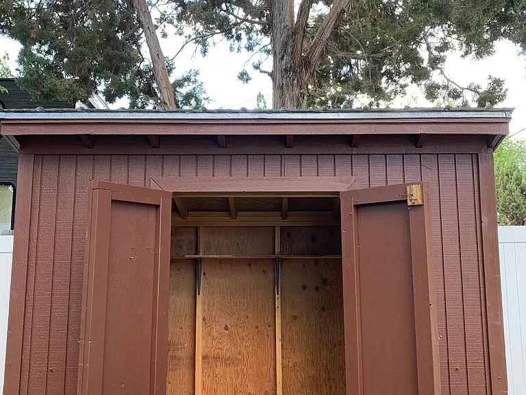 Interior shed with shelving