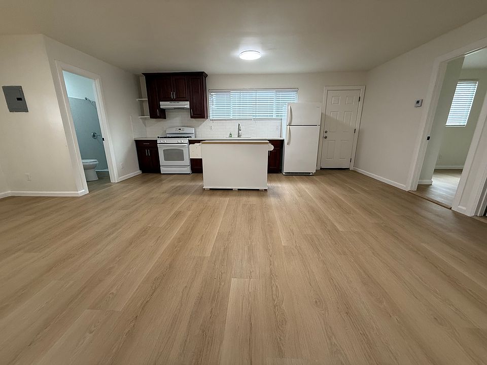 Great-room towards kitchen and front door