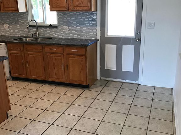 Kitchen w/backyard entrance and exit