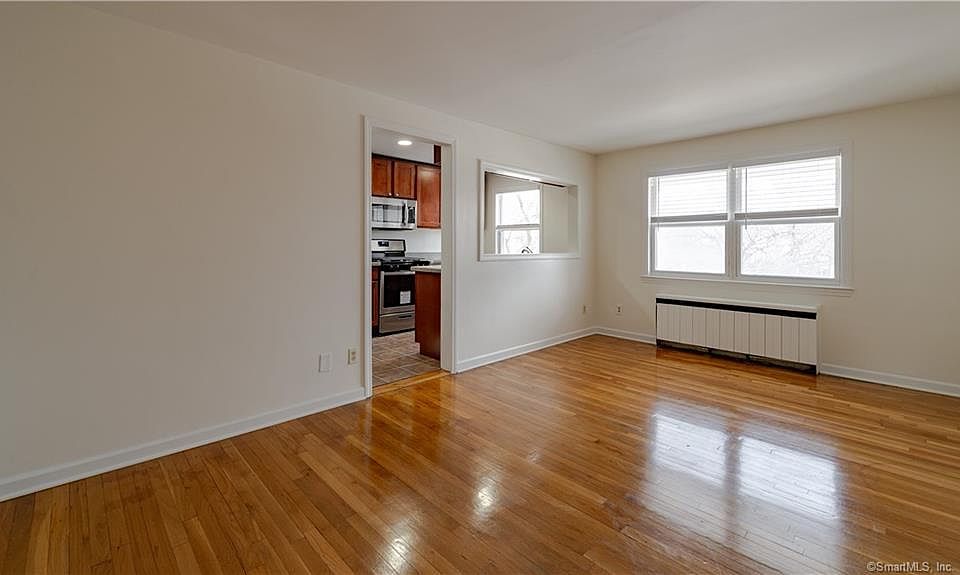 Living room Area with view of Kitchen
