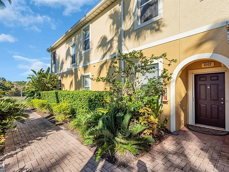 This residence is an end unit with the living area located upstairs