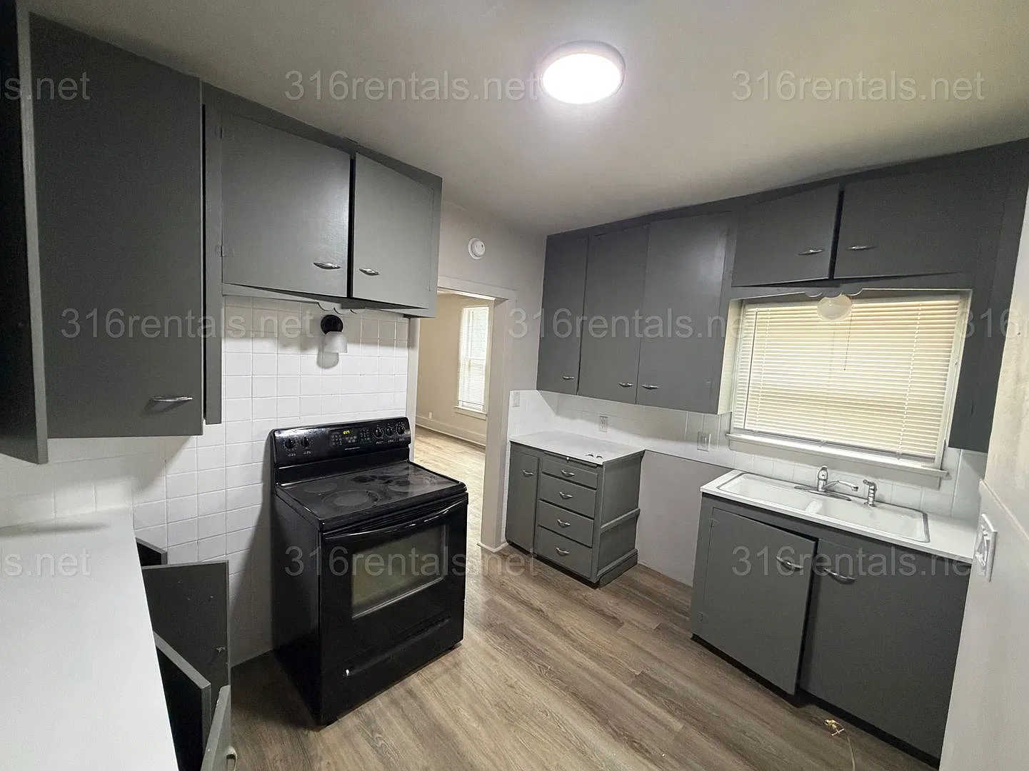 $1,099 | Updated 4BR, 1,300 Sq Ft Newton Home | New Kitchen & Bath | Pets OK — Photo 3