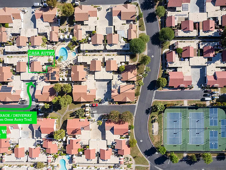 Partial aerial view of Canyon Sands community, showing Casa Autry location, driveway and the close walk to tennis and pickle ball courts.