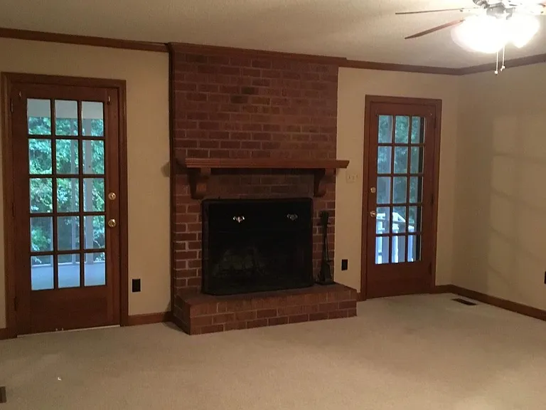 Fireplace with doors to covered porch