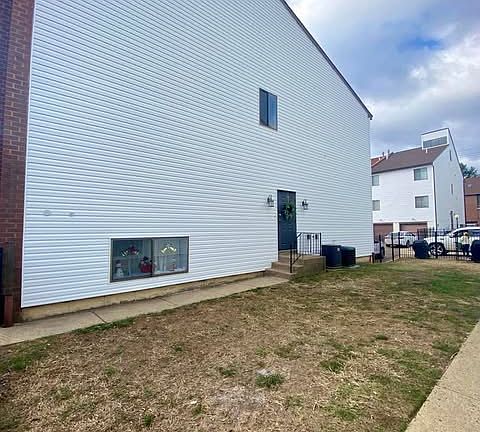 Side yard and entrance