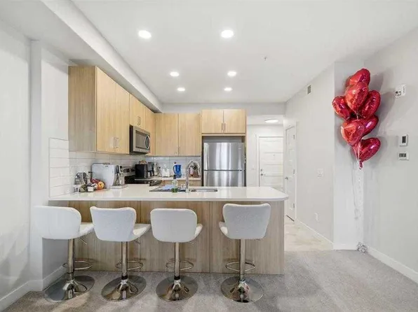 55 E Wolf Hollow Cres SE #318, Calgary, AB T2X 1T8