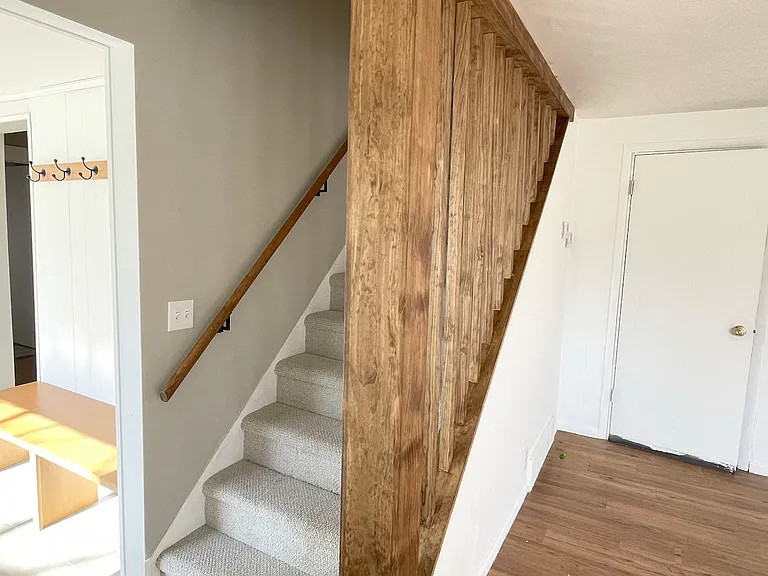 Living Room and a View into Front Entry
