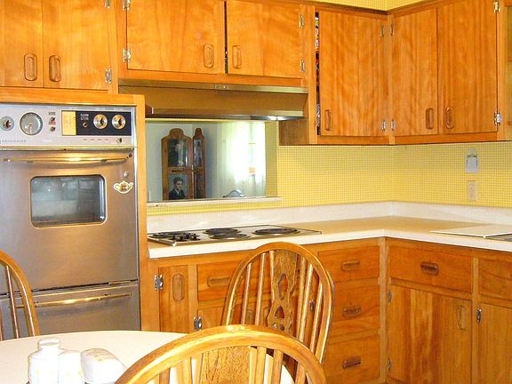 Bright kitchen with wood cabinets