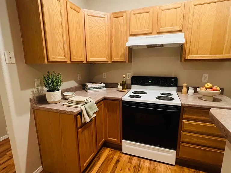 Kitchen, virtually staged with decor only. Appliances shown are included unless otherwise noted