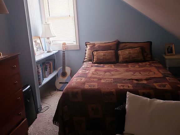 Back Bedroom with built in shelving.