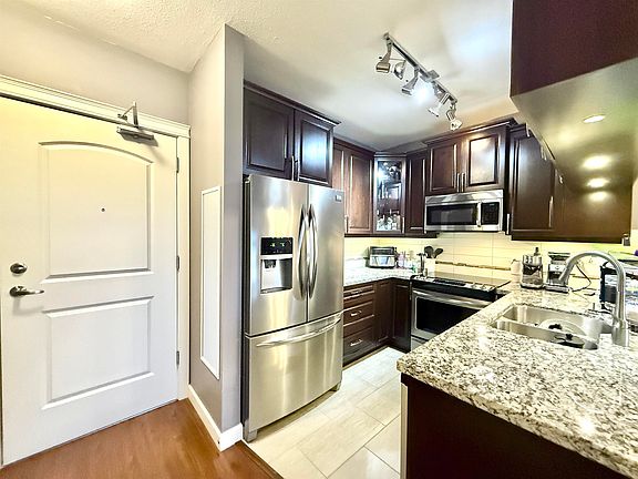 2nd image of 12655 190a St #209
