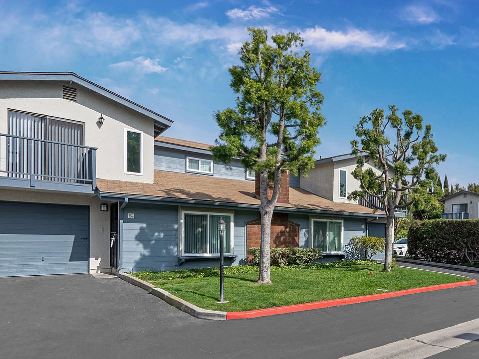 Front View of Units with Single Attached Garage. Two Story Townhome